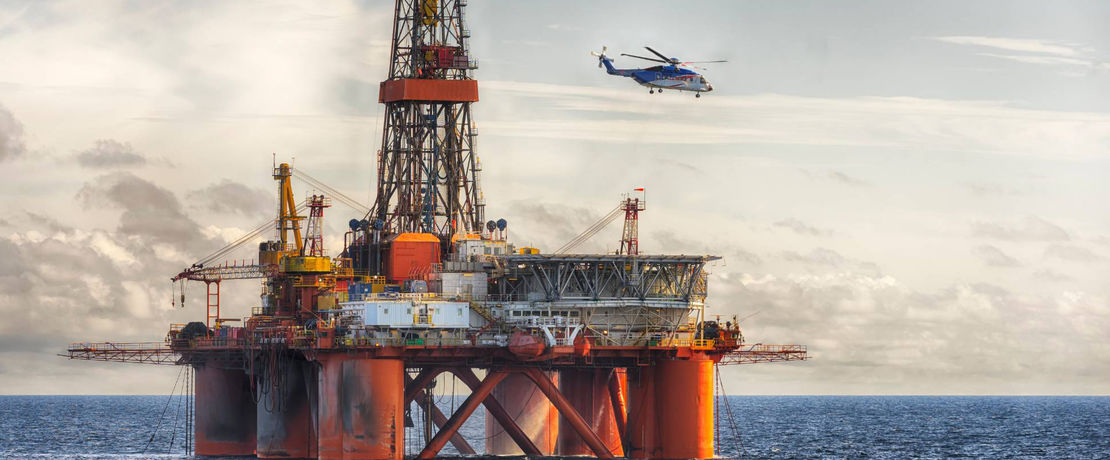 Oil rig and helicopter